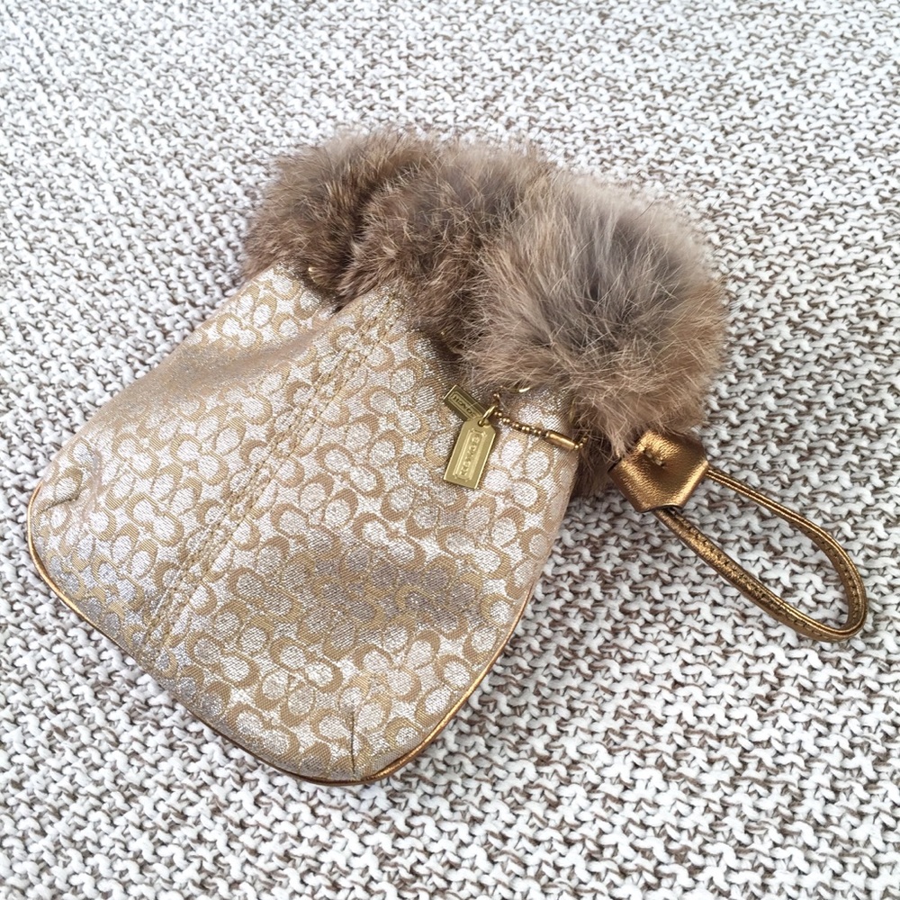 Coach metallic fur drawstring wristlet